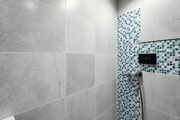 chic bathroom tiles, textured and patterned, being installed by a craftsman, photorealistic, intricate mosaic designs alongside plain tiles, highly detailed, dust particles in the air, sharpness and clarity, soft greys and blues, focused spot lighting, shot with a 35mm standard lens.